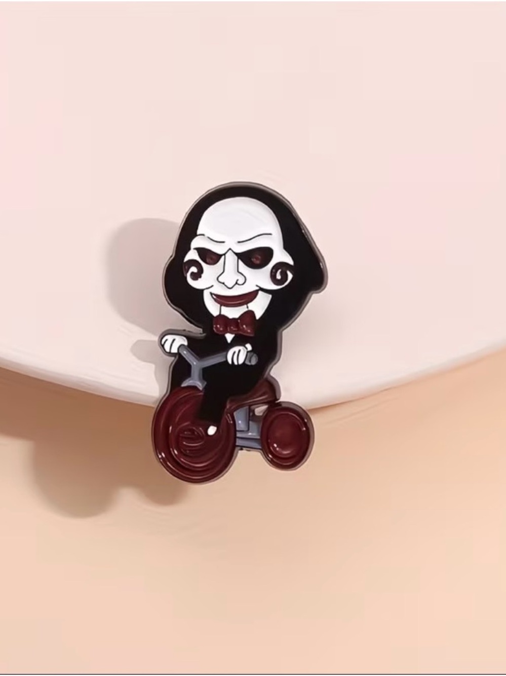 Saw Puppet Enamel Pin - Black, White & Burgundy Tricycle